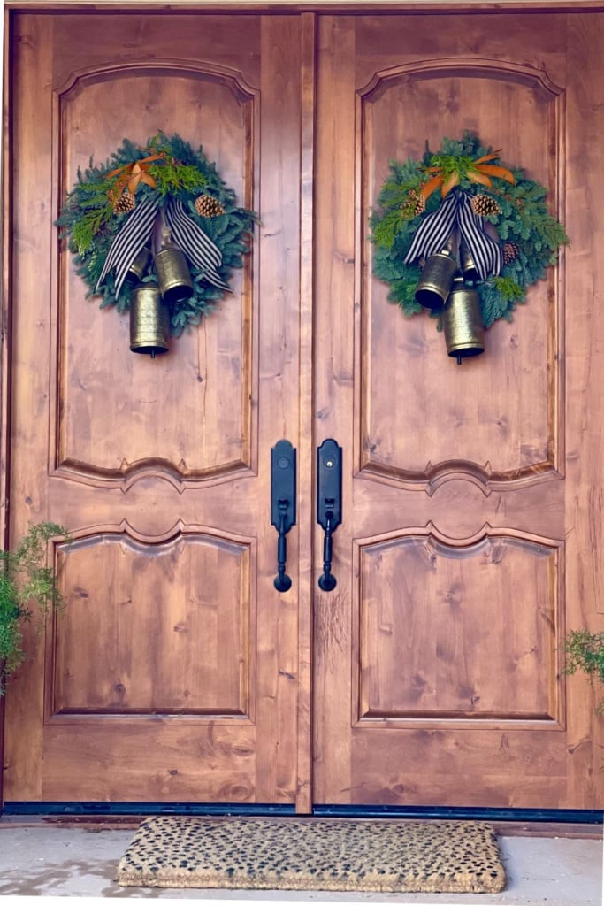 Front doors with wreaths and bells