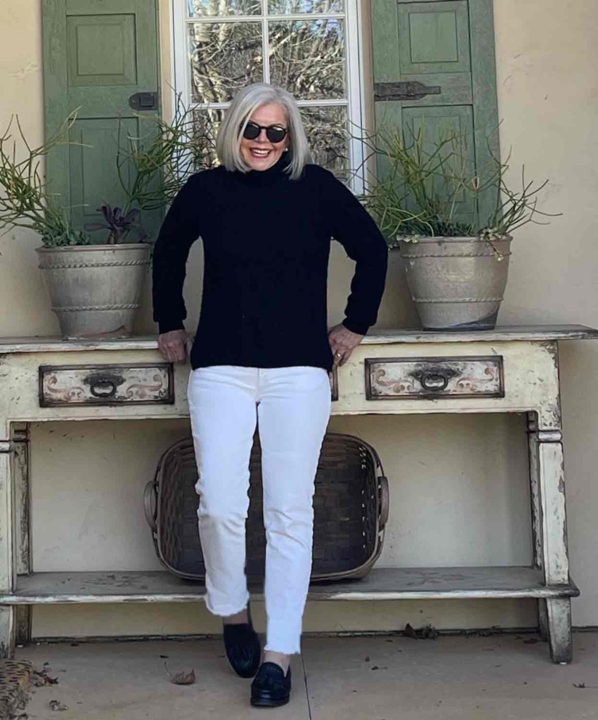 white girlfirend jeans black cashmere sweater