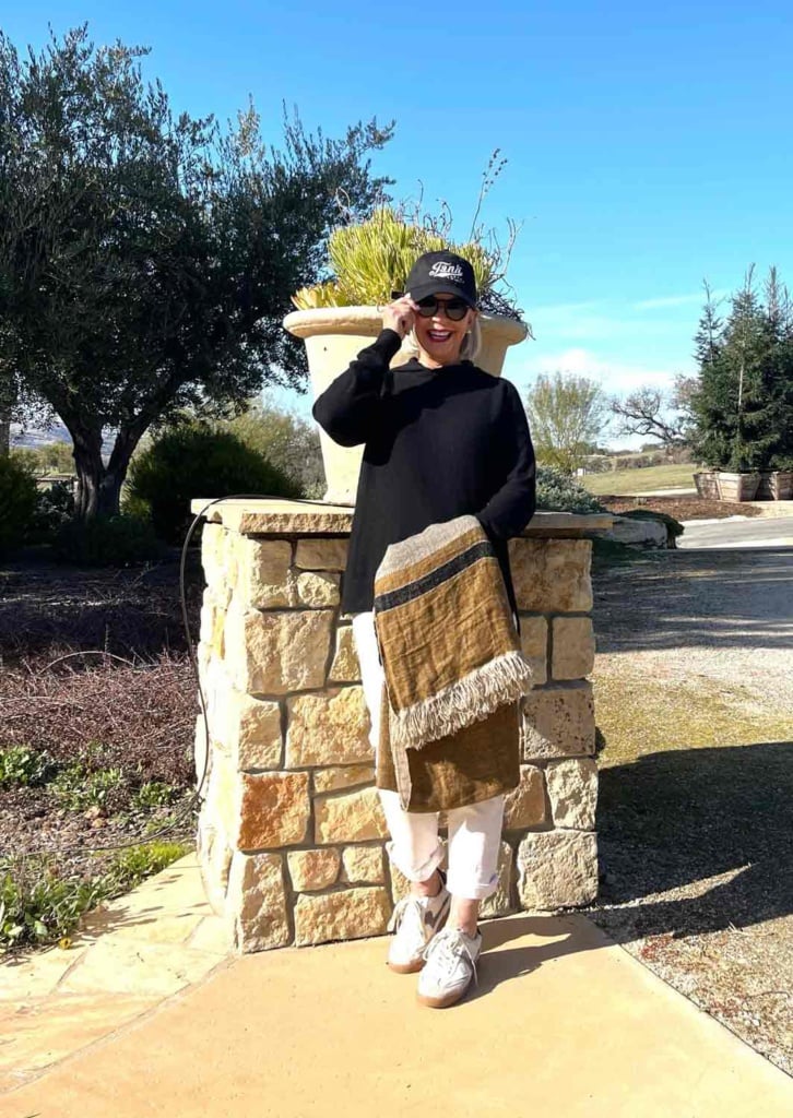 white jeans libeco throw cashmere sweater & basebaol cap