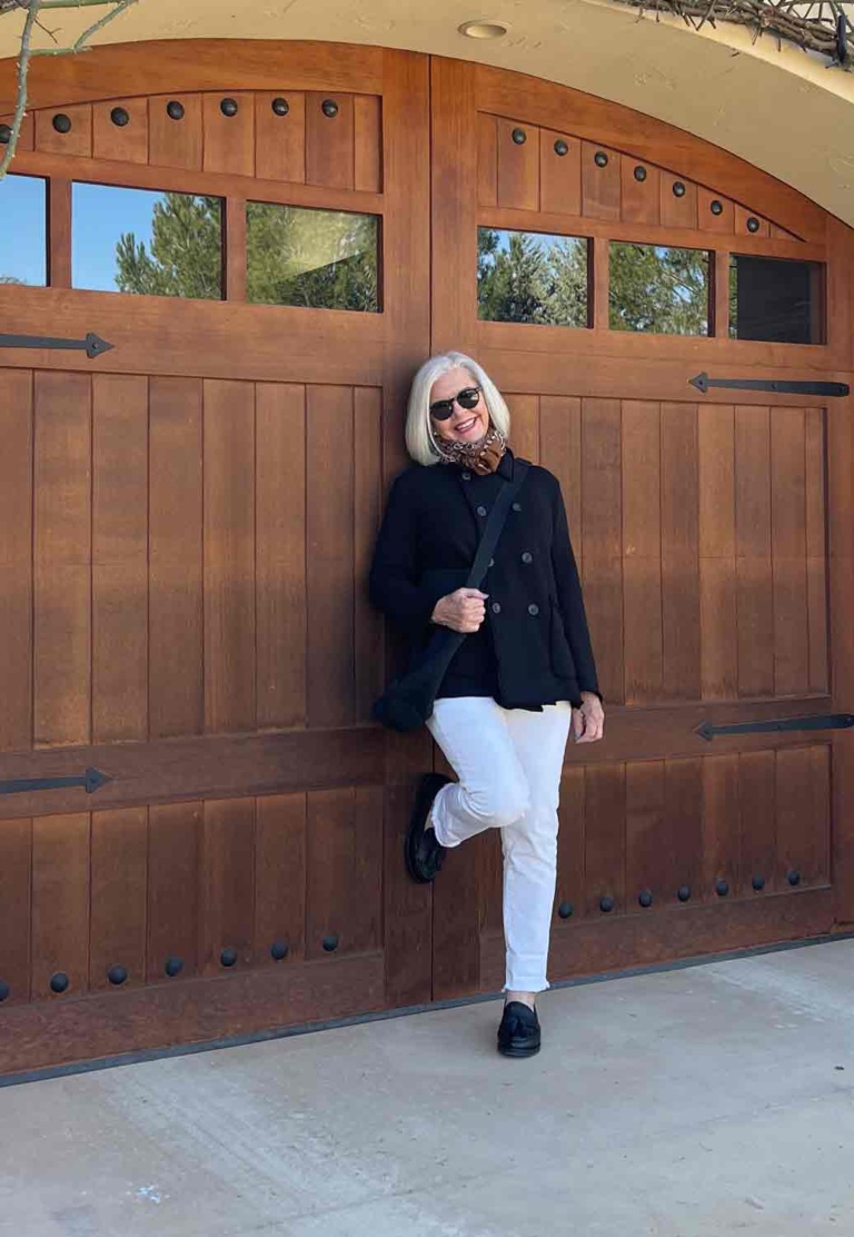 black cashmere sweater white jeans