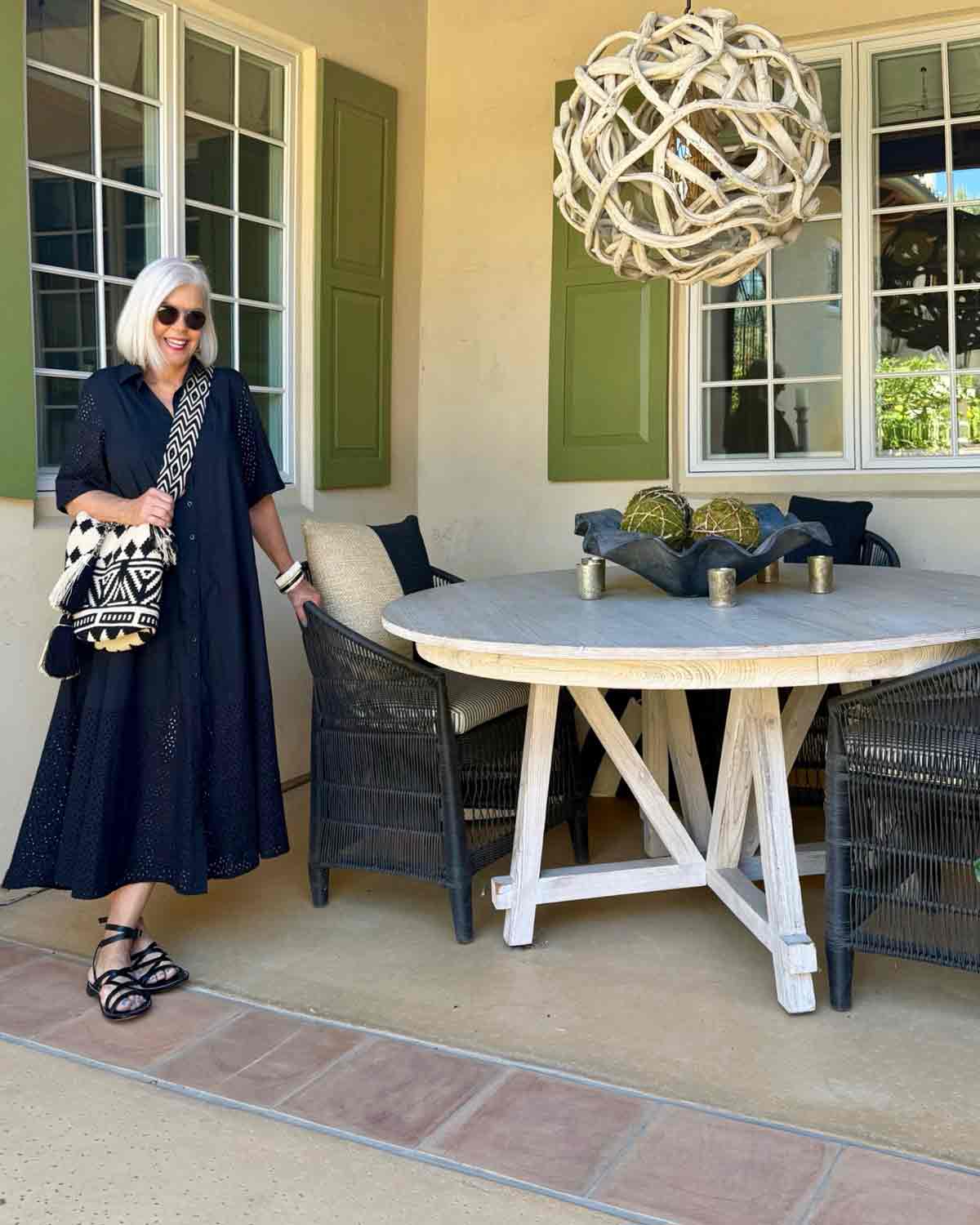 cindy hattersley in BR black eyelet dress-over 60 resort wear