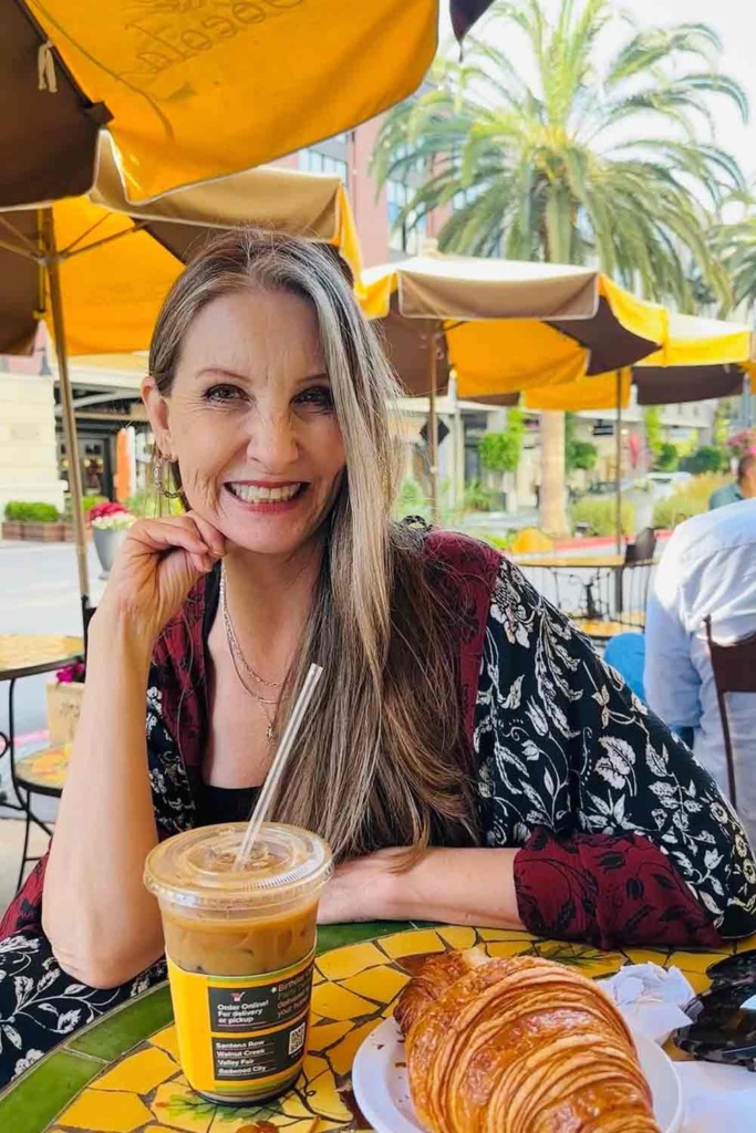 Dawn Lucy having coffee in a cafe