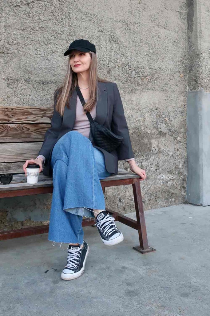 Dawn Lucy in baseball cap and jeans