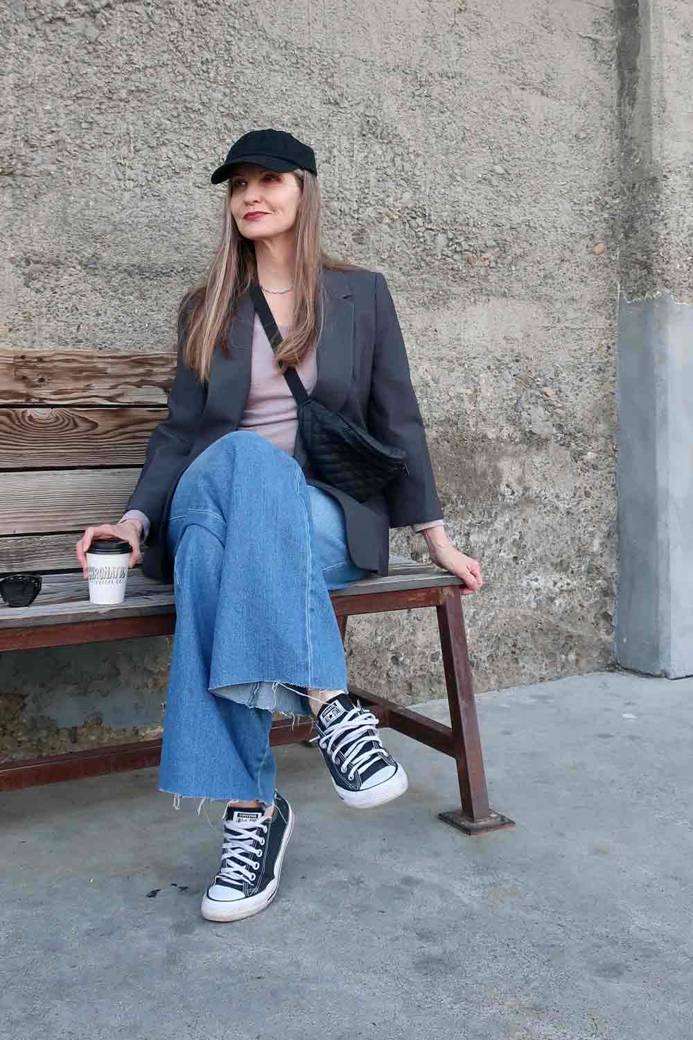 Dawn Lucy in baseball cap and jeans