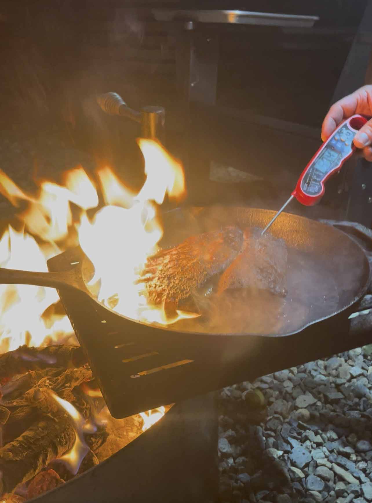 rack of lamb over open fire Auto Camp