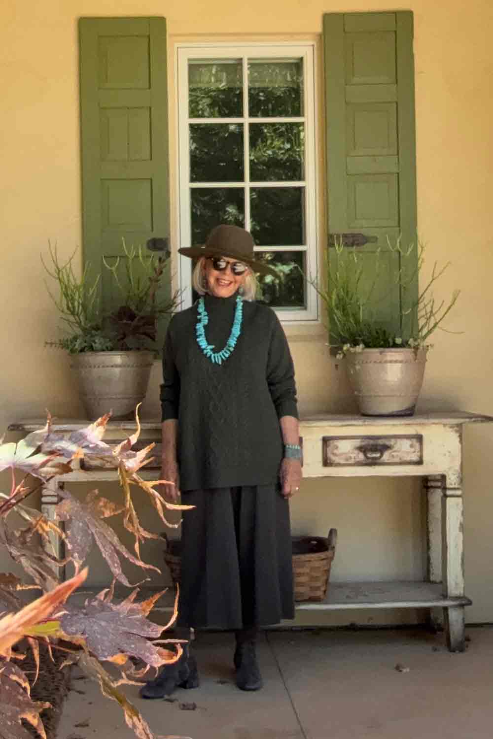 Garnet Hill Cashmere cable knit with Native American jewelry