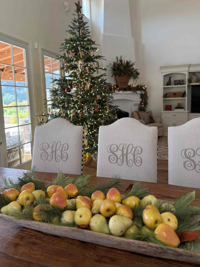 Dough bowl with faux pears and greens