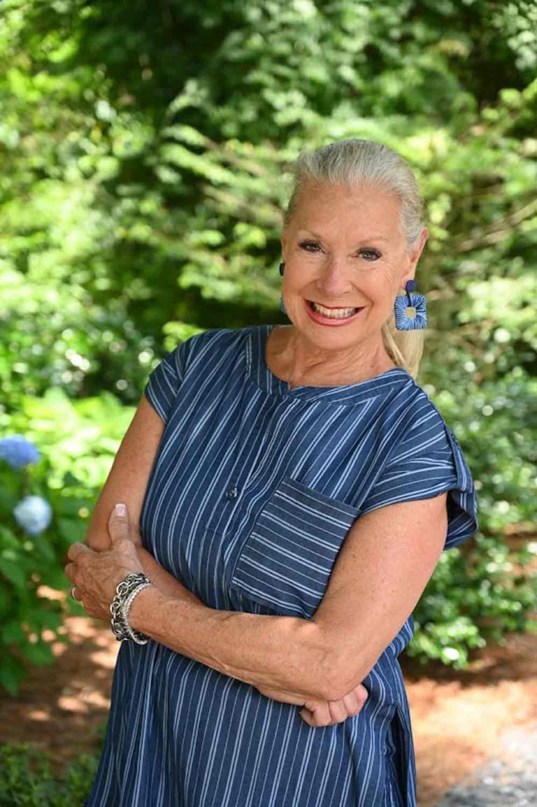 Robin LaMonte in blue striped dress