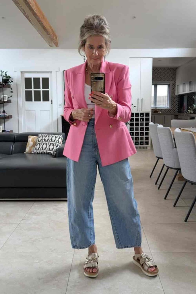 suzie richetti in jeans and hot pink blazer