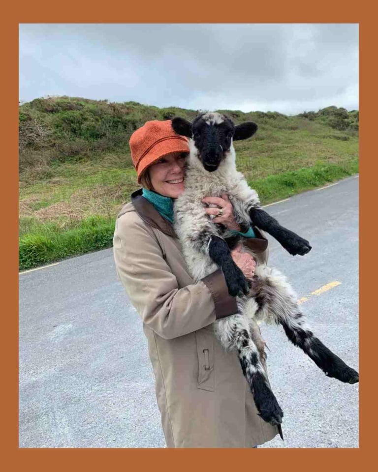 Yoga Instructor Jennifer Parker with lamb