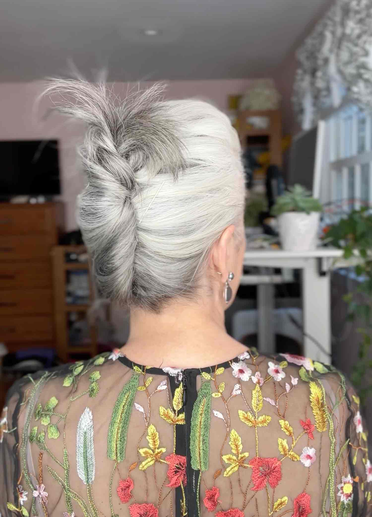 Kerry-Lou Henson, silver hair expert and founder of Silver Style Studio with with french twist