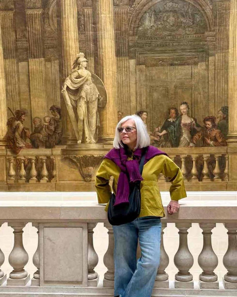 cindy hattersley in front of Mural in the Marais Paris