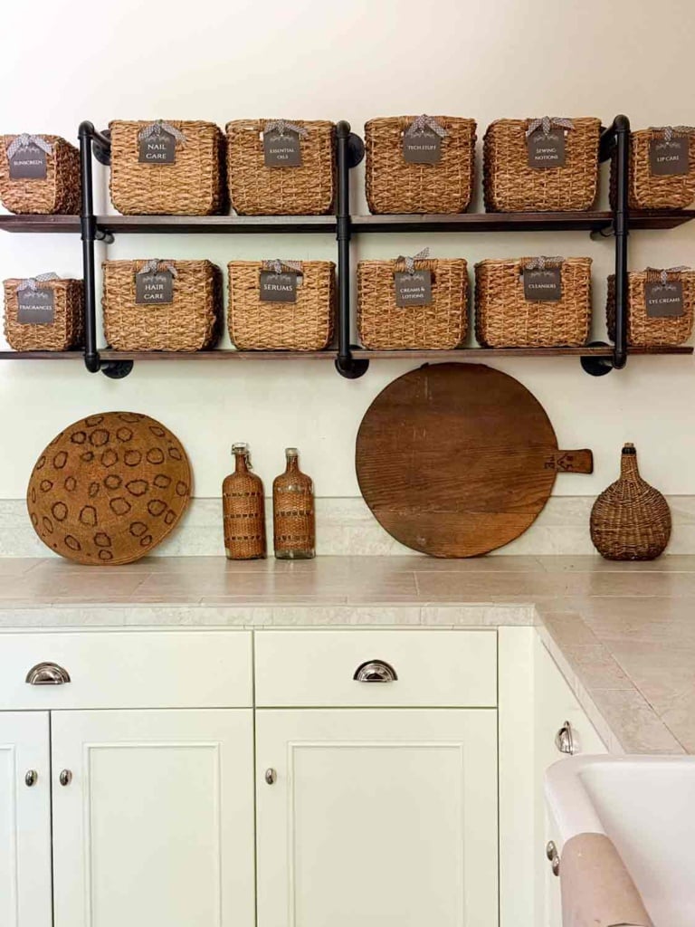 floating shelves in laundry room with baskets for storage