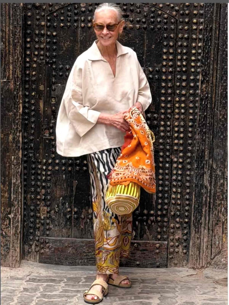 Linda V Wright in Morocco wearing silk pants scarf and bag from Crimson Cashmere