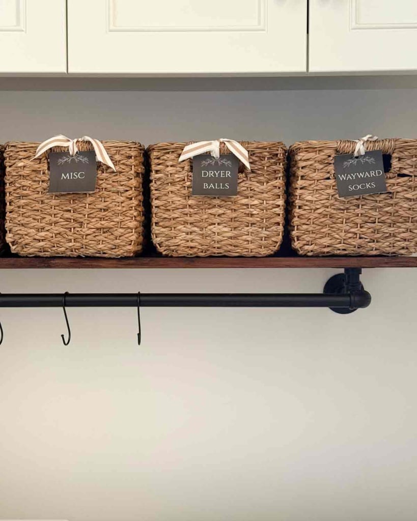 basket and floating shelf storage in laundry room