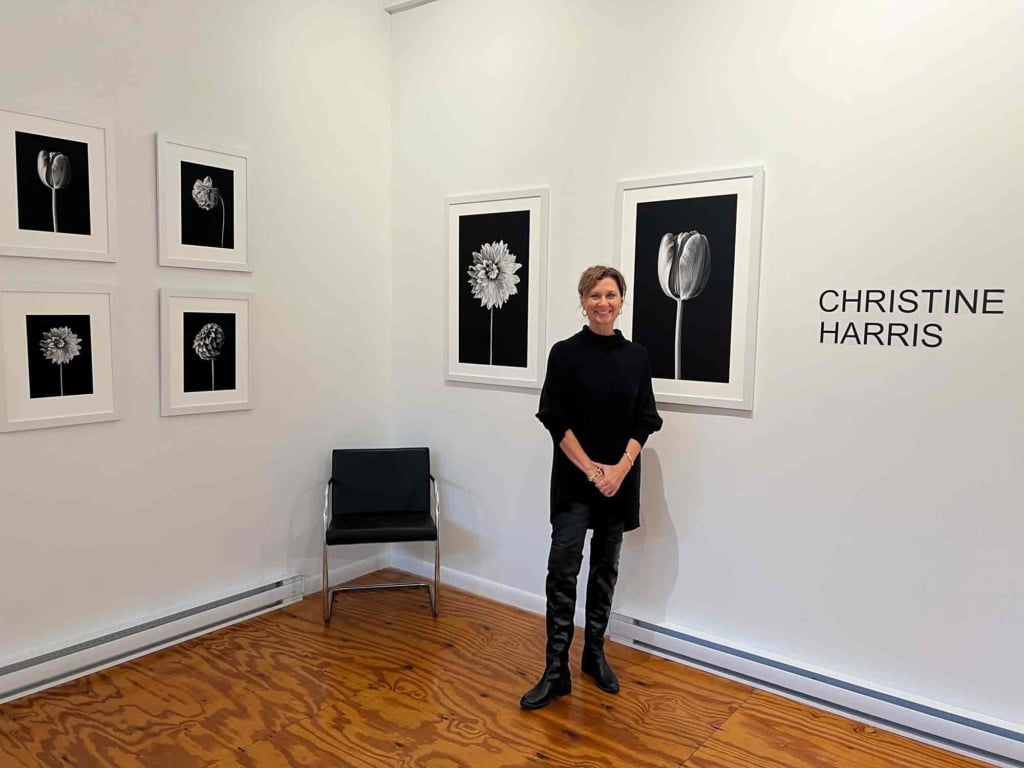 Photographer Christine Harris with her work