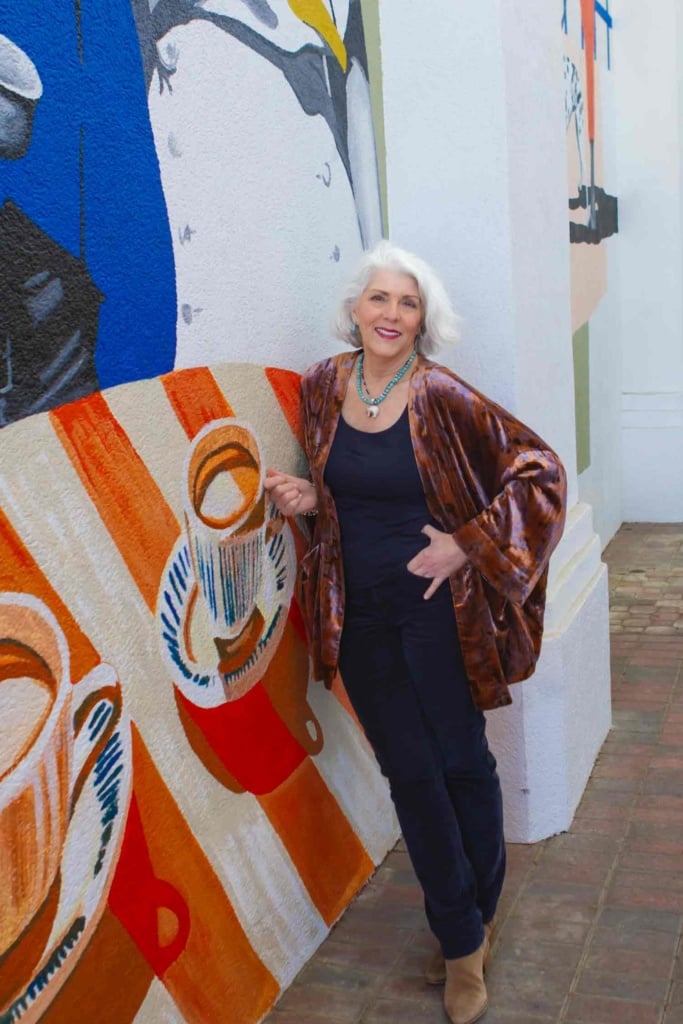 Kelli Enlow at signage